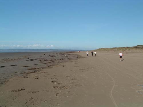 La larga playa Cefn Sidan La larga playa Cefn Sidan
